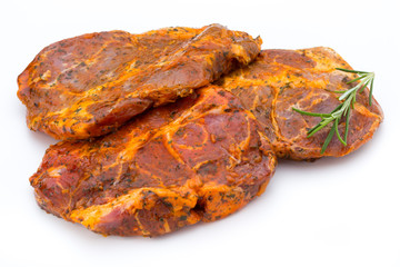 Pork chop, marinated. Isolated on the white background.