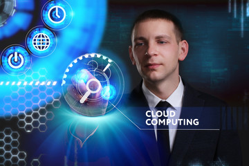 Business, Technology, Internet and network concept. Young businessman working on a virtual screen of the future and sees the inscription: Cloud computing