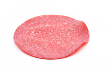 Salami smoked sausage one slice isolated on white background cutout.