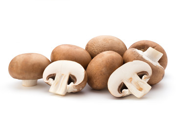 Fototapeta na wymiar Fresh champignon mushrooms isolated on white.