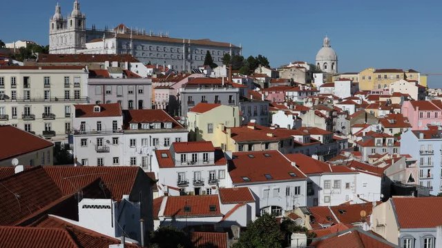 Panoramic view of the city in the district of Alfama overlooking the port at clear sunny day. Lisbon, Portugal
