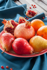 Different kind of fruits on a wooden table
