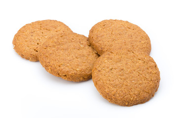Stacked short pastry cookies isolated on white background.