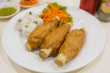 Fried shrimp mousse on sugar cane skewer or Chao Tom Vietnamese food