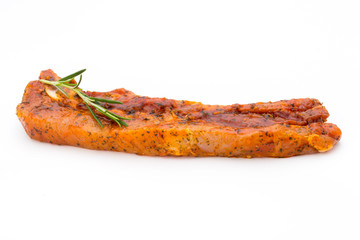 Spicy marinated spare ribs barbecued on the white background.