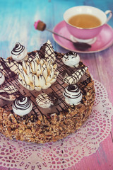 Cake on color background