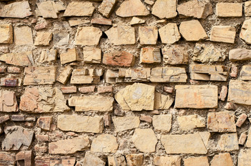 The texture of old stones together with cement.