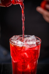 Bartender is making cocktail