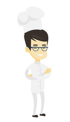 Confident male chief cook with arms crossed.