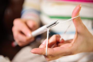 Women's hands knitting