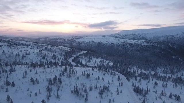 Slow flight in northern mountains in winter