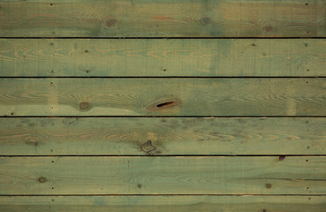 Old, rustic, weathered green wood background, rough boards