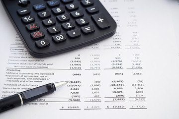Business background, financial data and accounting report concept with pen