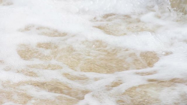A strong flow of water. Water boils and foams 3