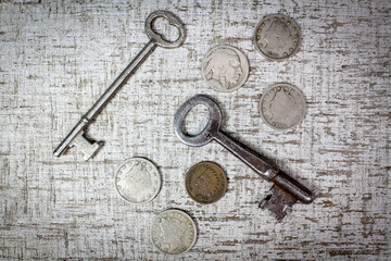Antique skeleton keys nickels and dimes close-up