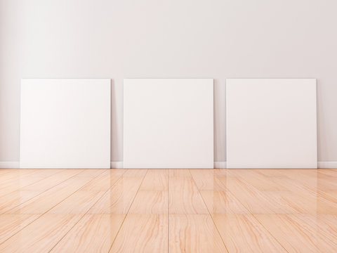 Three Square white Canvases Mockup stand on wooden floor in empty room, 3d rendering