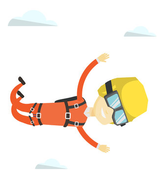 Asian parachutist jumping with parachute.