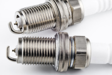 Spark plugs on a light background