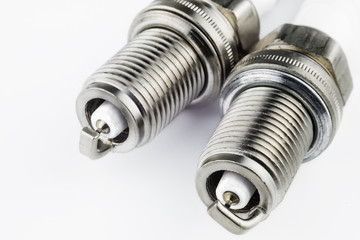 Spark plugs on a light background