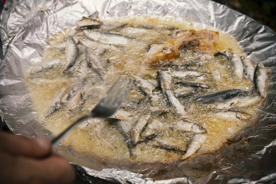 frying small fish in oil