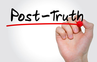 Hand writing inscription Post Truth with marker, concept