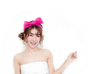 close up the beautiful woman asian look with pink bow on her hair