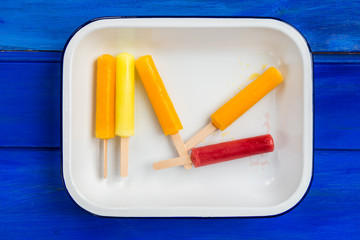 Bright Ice Popsicles made from Lemon, Pineapple, Berries