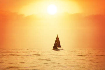 Plakat Sailboat at sunset