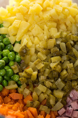 Flat lay image chopped pickles green peas carrot and potatoes