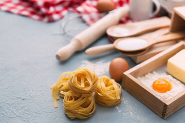 Raw homemade pasta and ingredients for pasta