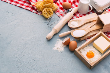 various kitchen utensils on vintage table