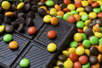 Chocolate bar and colorful candy