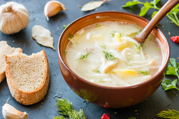 Chicken soup with noodles and potatoes