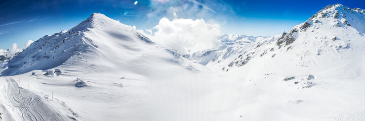 Fototapeta na wymiar Sunning view to Tyrolian Alps covered by fresh snow, Zillertal, Austria