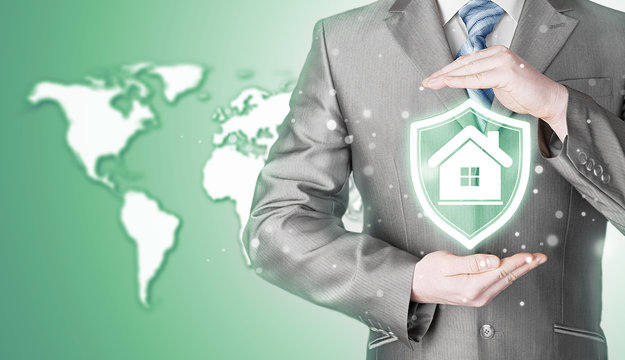 House protection and insurance. Home shield. Real estate safety. World map background. Worldwide insurance.