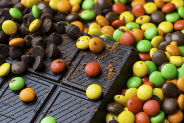 Pile of candy and chocolate bar