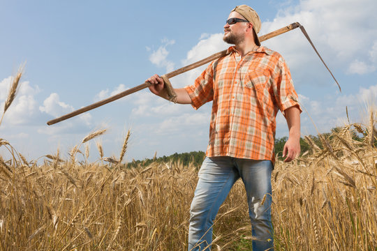 Modern Farmer With Scythe