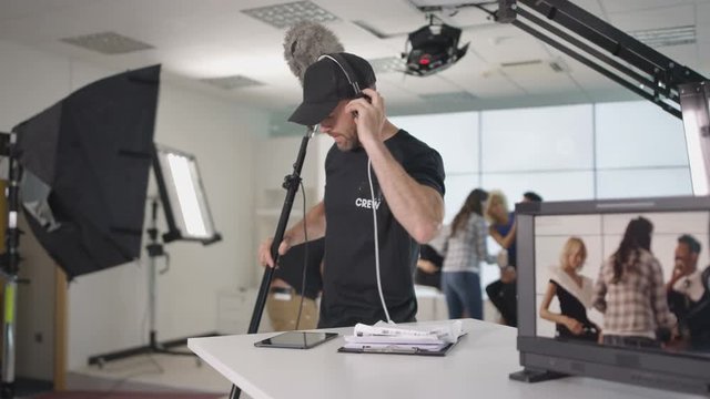  TV crew in studio, preparing to go live on air