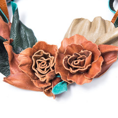 Leather flowers isolated on white