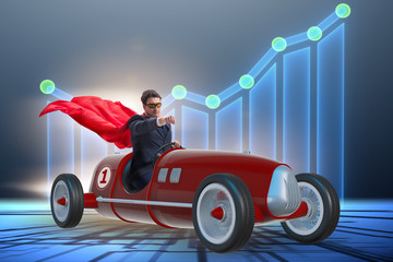 Superhero businessman driving vintage roadster