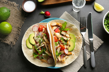 Delicious tacos with tequila lime chicken on plate