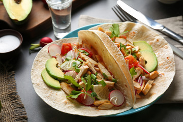 Delicious tacos with tequila lime chicken on plate