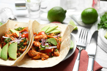 Delicious tacos with tequila lime chicken on plate