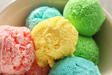 Obraz na płótnie Canvas Bowl with different tasty ice cream, closeup