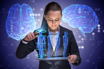 Futuristic remote diagnostics concept with businesswoman