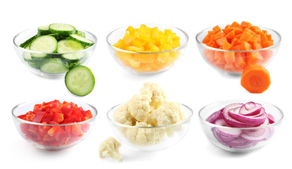 Sliced onion in bowl on white background