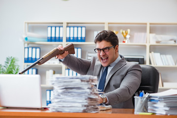 Angry aggressive businessman in the office