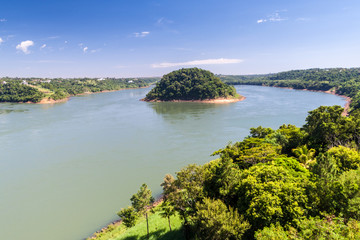 Border river Parana between Brazil and Paraguay - obrazy, fototapety, plakaty