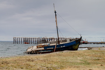 Obraz premium Old wrecked ship in Punta Arenas, Chile.