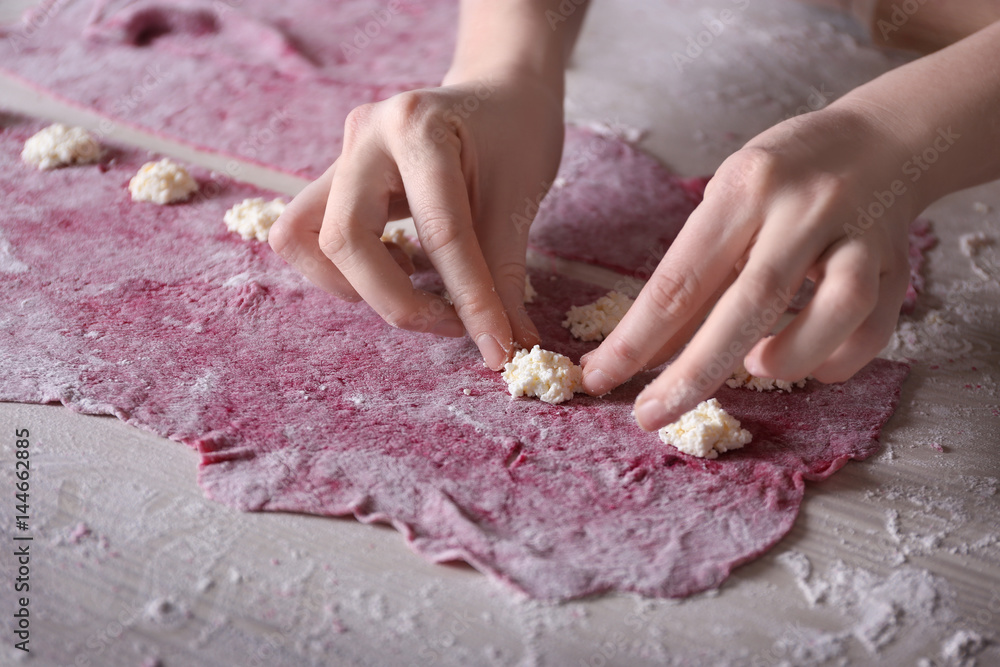 Canvas Prints woman making ravioli on table